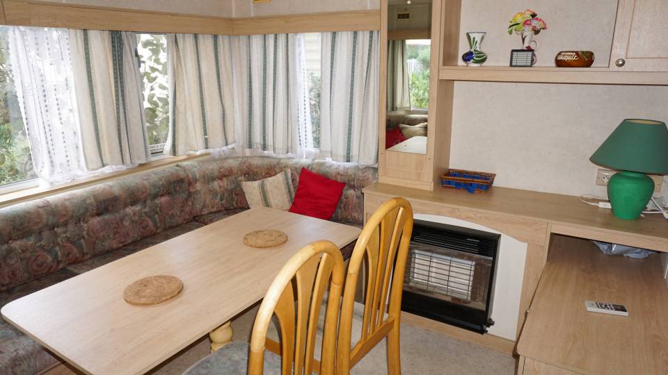 Salon panoramique du mobil home BK BLUEBIRD Conquest 2003 - 3 chambres