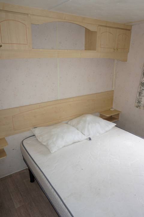 Chambre parentale du mobil home BK BLUEBIRD Conquest 2003 - 3 chambres