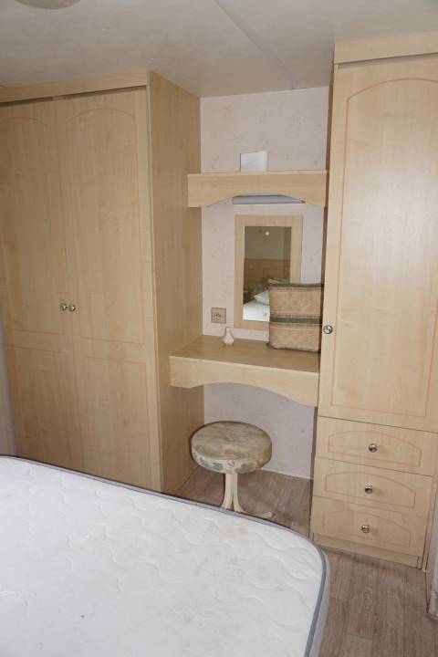 Chambre parentale du mobil home BK BLUEBIRD Conquest 2003 - 3 chambres